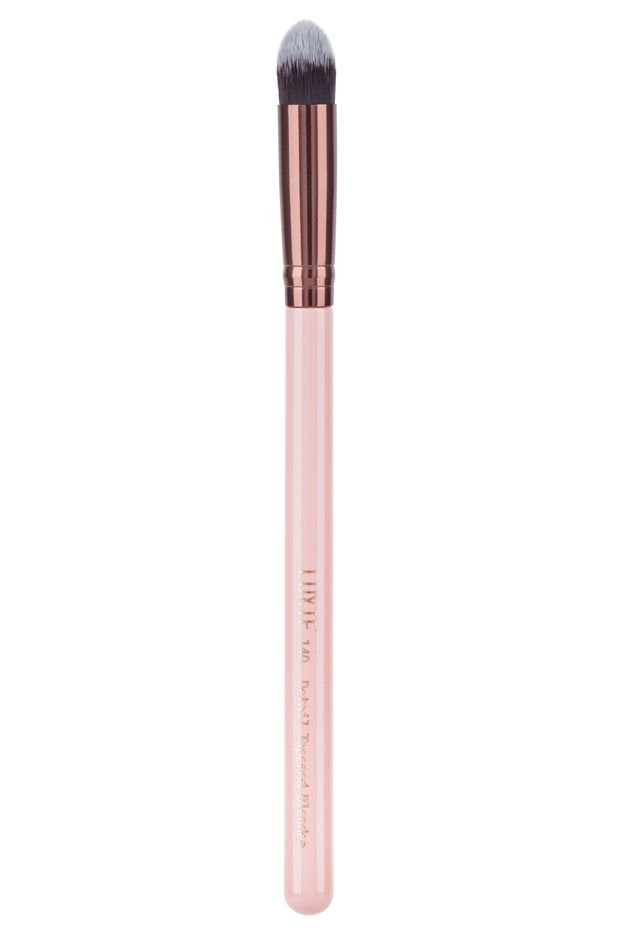 Professional quality results without harming animals or the environment. The perfect contour brush and concealer brush for your beauty needs. A handcrafted blend of soft synthetic hairs, our cruelty-free and vegan makeup brushes are both hypoallergenic and gentle on the skin. With a pink wooden handle and rose gold ferrule, this detailed blender will light up your makeup organizer. Achieve everything from a natural makeup look to an airbrush makeup finish with this tapered blender.