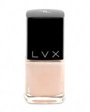 Ultra rich and creamy, high shine, smooth finish and is a superior long wear formula. Manicure quality in 1-2 coats. 10 toxin free formula. Use LVX Gel Top Coat for an ultra high shine finish. Luxury cruelty-free and vegan nail polish inspired by high fashion. Lasts up to two weeks  Ecru Nail Lacquer