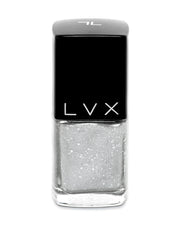 Ultra rich and creamy, high shine, smooth finish and is a superior long wear formula. Manicure quality in 1-2 coats. 10 toxin free formula. Use LVX Gel Top Coat for an ultra high shine finish. Luxury cruelty-free and vegan nail polish inspired by high fashion. Lasts up to two weeks. Stardust Nail Lacquer